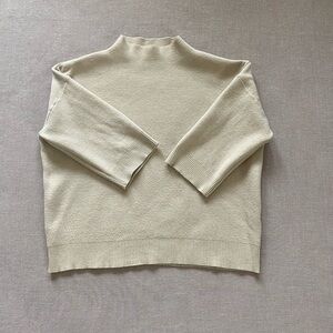 Brand Bazar cream sweater.